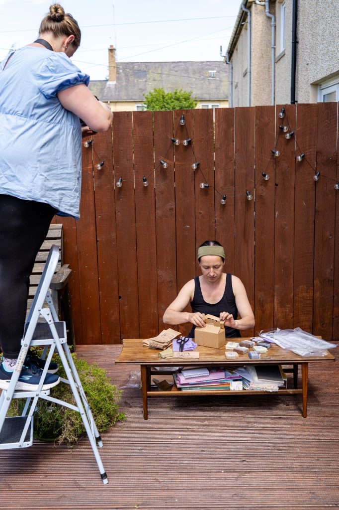 Monicja photographing the owner of Natural Soaps Penicuik during a small business brand shoot.